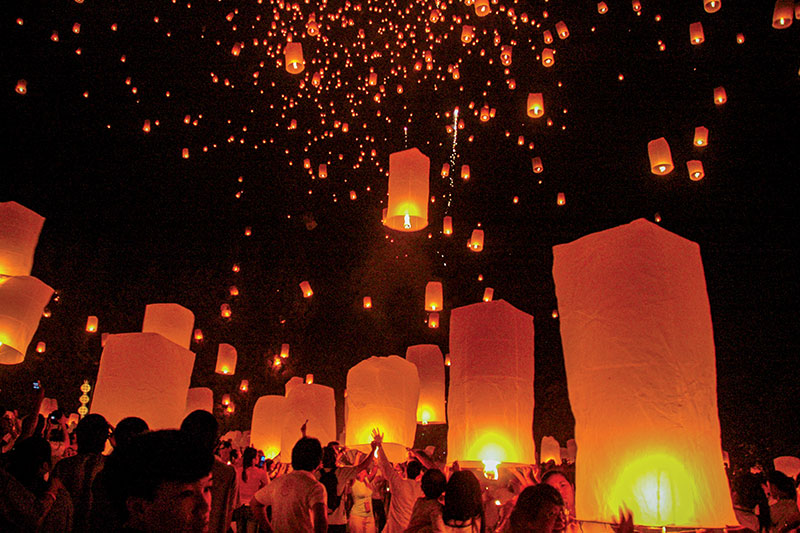 Thousands of sky lanterns dot the sky