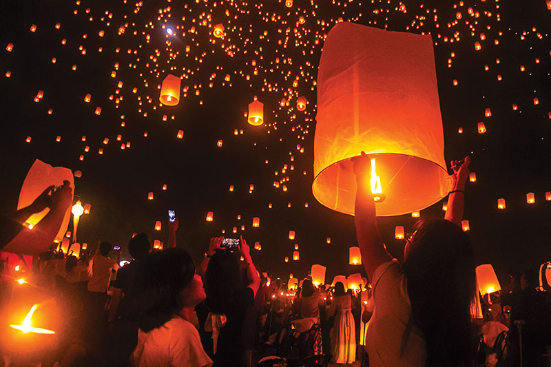 Thousands of sky lanterns illuminate the night sky