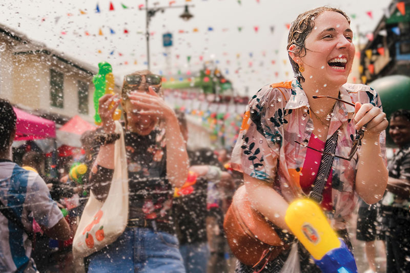 Travellers and locals alike get together and have fun with the water fight on Bangkok’s Khaosan Road