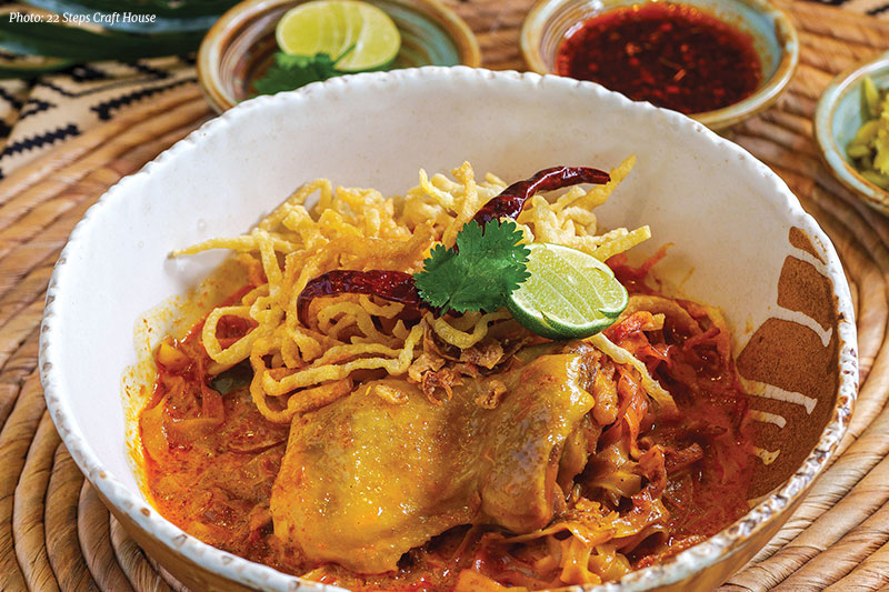 Khao Soi Gai, the iconic Northern Thai dish, served at 22 Steps Craft House at Hotel Indigo Bangkok Wireless Road Khao Soi Gai, the iconic Northern Thai dish, served at 22 Steps Craft House at Hotel Indigo Bangkok Wireless Road