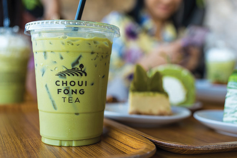 The vibrant green tea bushes offer a perfect backdrop for selfies at Choui Fong Tea Plantation