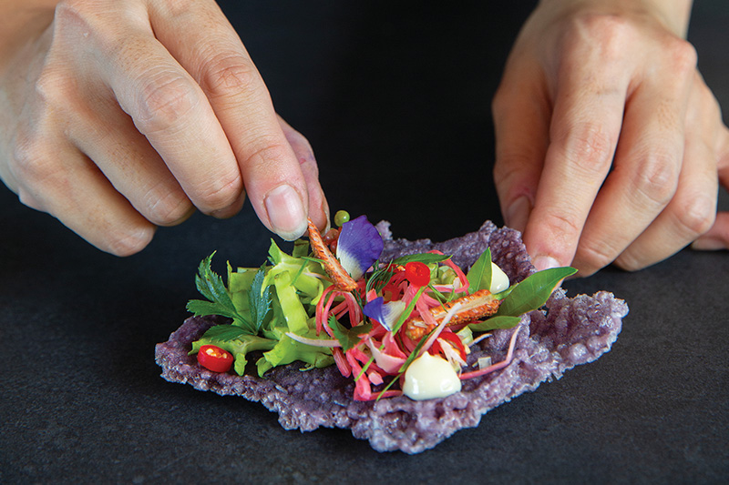 Mangosteen salad with young cashew leaves