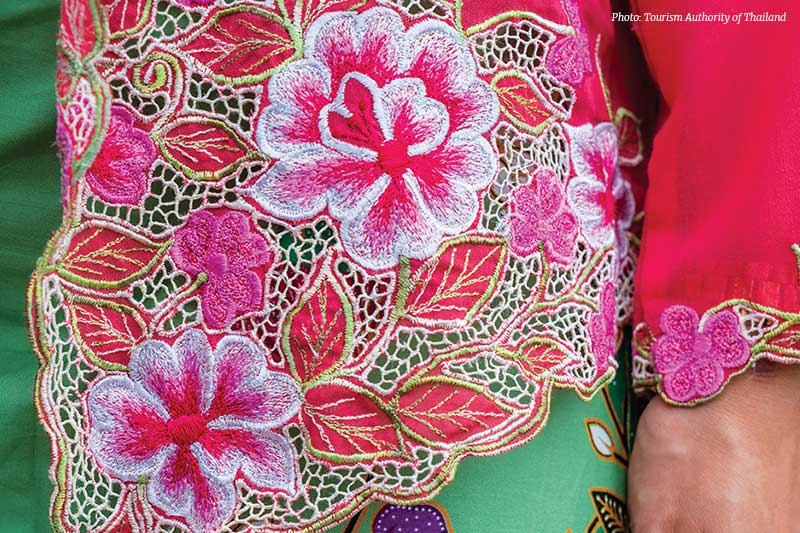 Intricate floral embroidery showcases the delicate craftsmanship that defines the Thai Baba Kebaya | Fah Thai Magazine, Inflight Magazine of Bangkok Airways